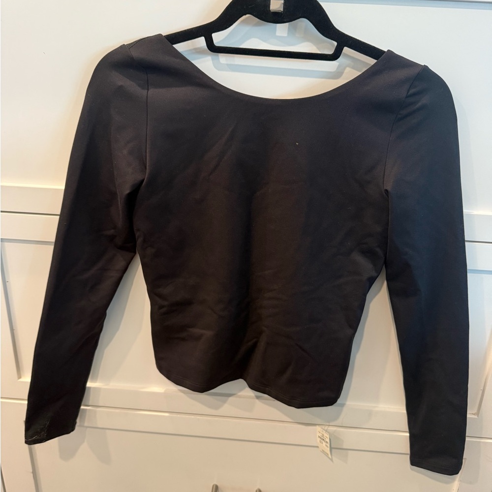 American eagle long sleeve black top with low scoop in back.